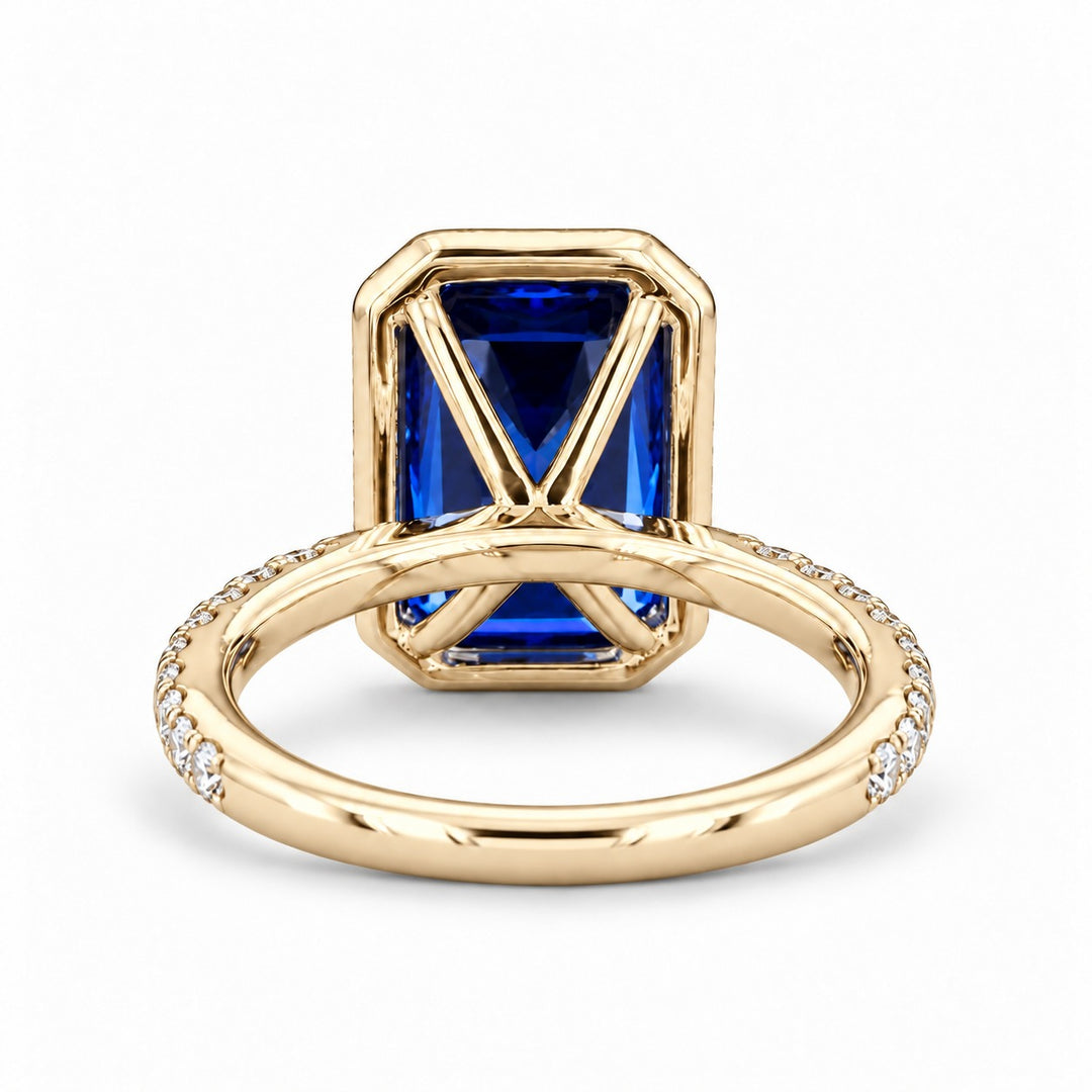 The Regalia emerald-cut lab sapphire halo ring in 14K yellow gold, back view