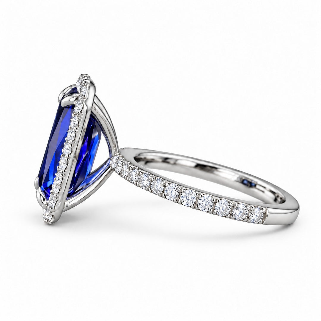 The Regalia emerald-cut lab sapphire halo ring in platinum, side view