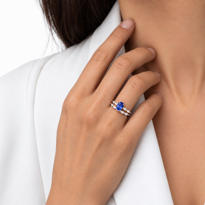 The Maeve Set oval lab sapphire ring and band in 14K rose gold, worn on hand