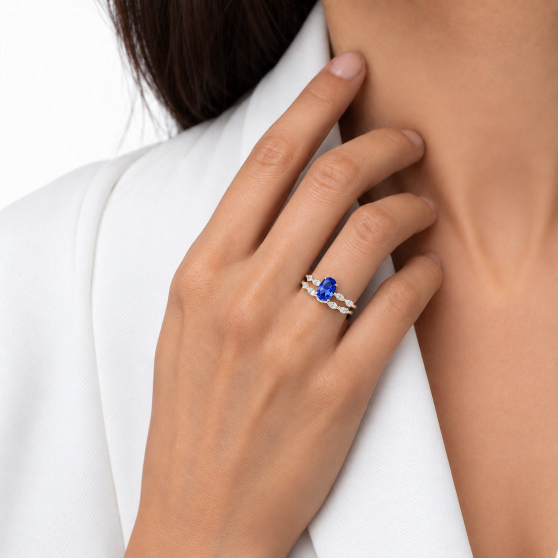 The Maeve Set oval lab sapphire ring and band in 14K yellow gold, worn on hand