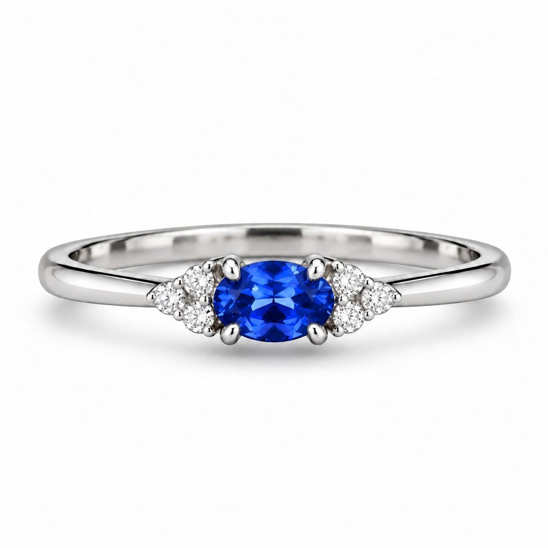 The Wren — Blue Oval Sapphire with Diamond Accents Ring in platinum, front view