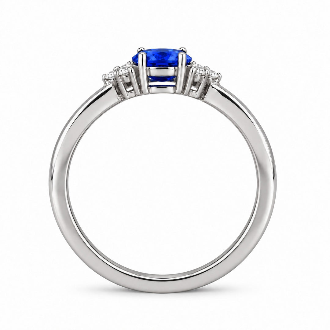 The Wren east-west oval blue sapphire ring in platinum, profile view