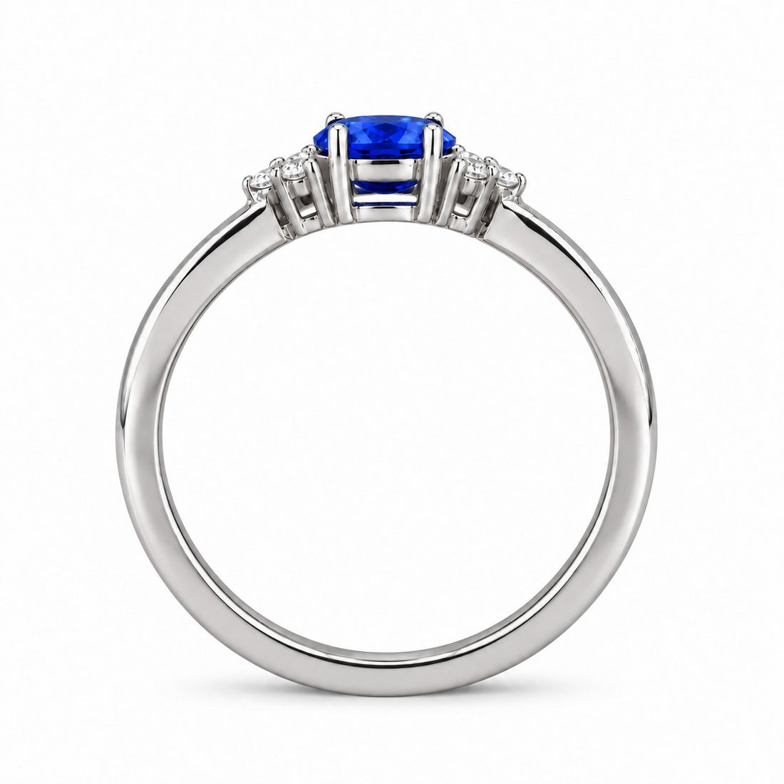 The Wren east-west oval blue sapphire ring in platinum, profile view