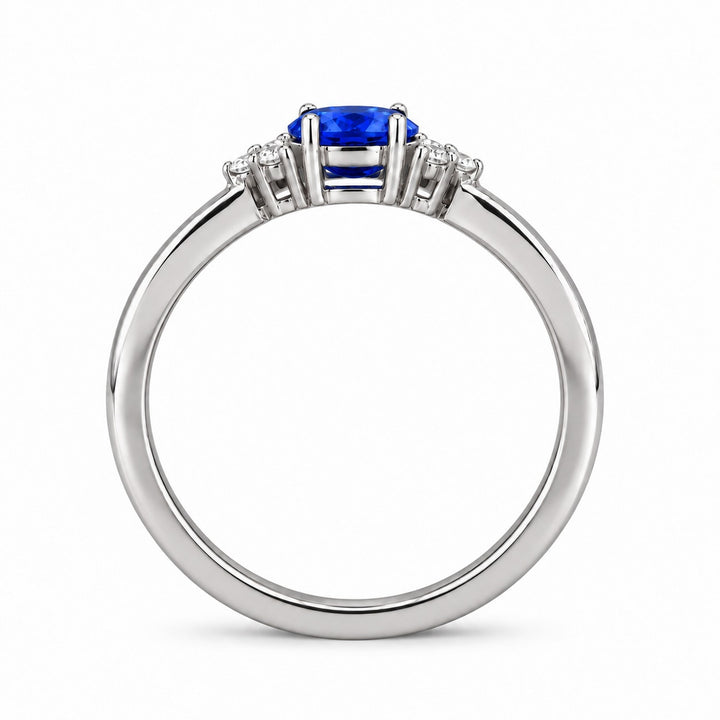 The Wren east-west oval blue sapphire ring in platinum, profile view