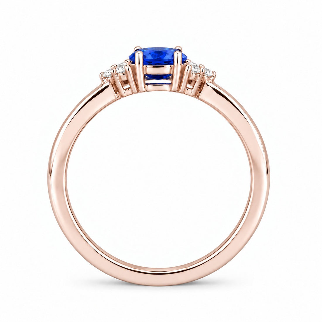 The Wren east-west oval blue sapphire ring in 14K rose gold, profile view