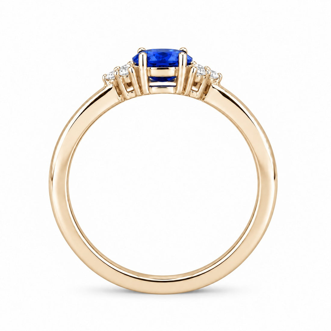 The Wren east-west oval blue sapphire ring in 14K yellow gold, profile view