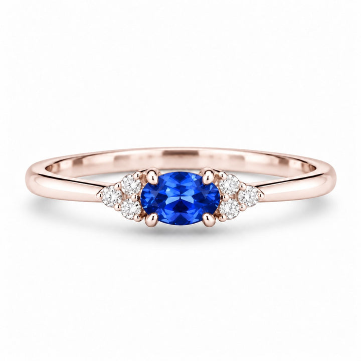 The Wren — Blue Oval Sapphire with Diamond Accents Ring in 14K rose gold, front view