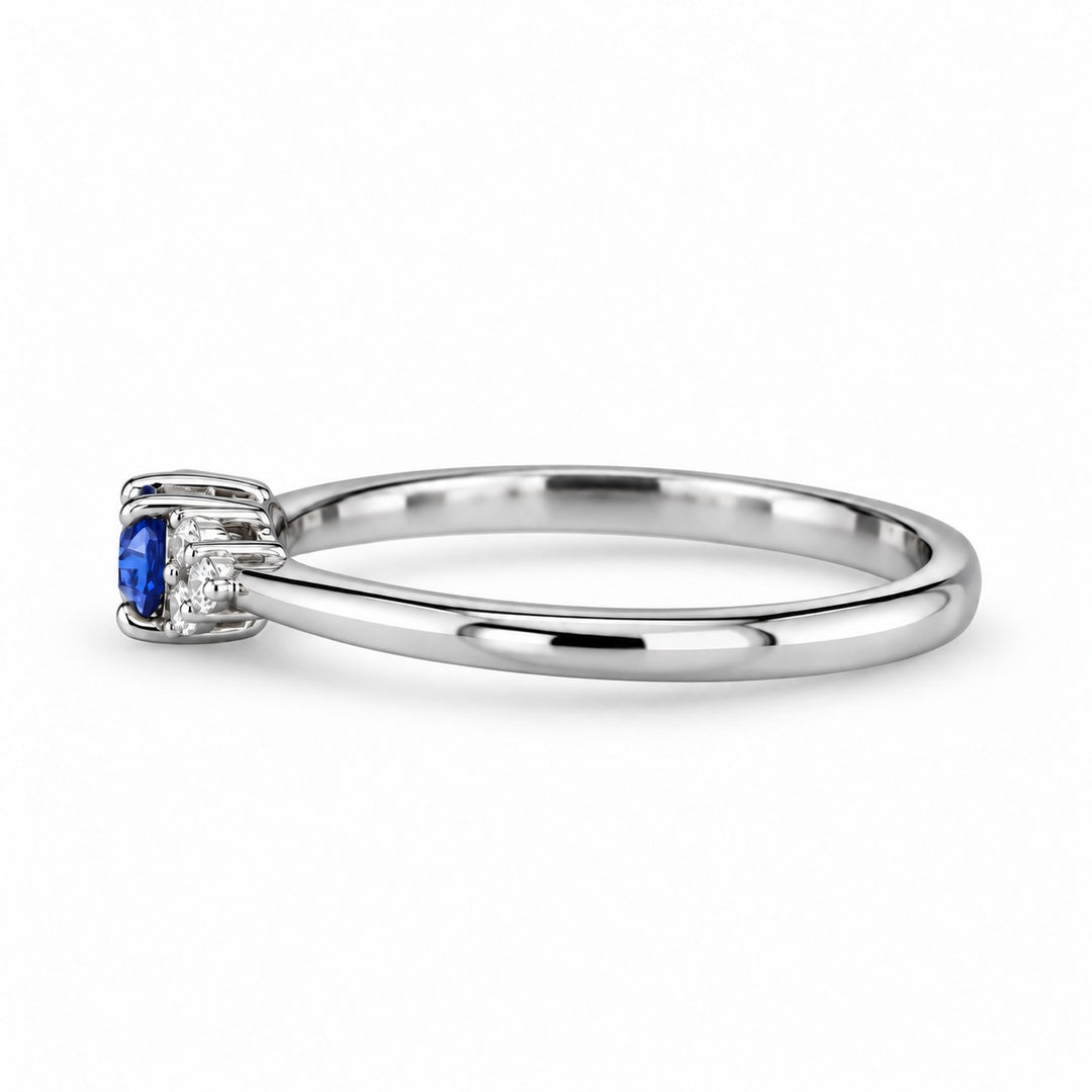 The Wren east-west oval blue sapphire ring in platinum, side view