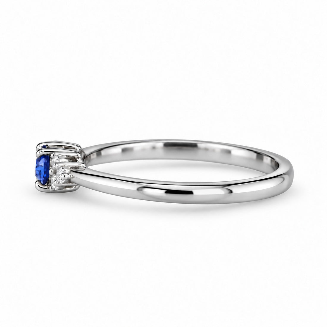 The Wren east-west oval blue sapphire ring in platinum, side view