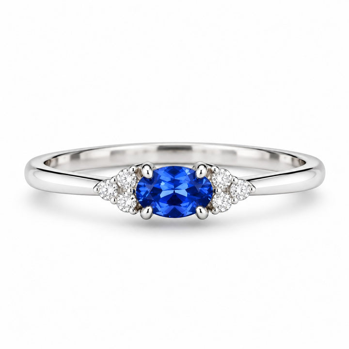 The Wren — Blue Oval Sapphire with Diamond Accents Ring in 14K white gold, front view