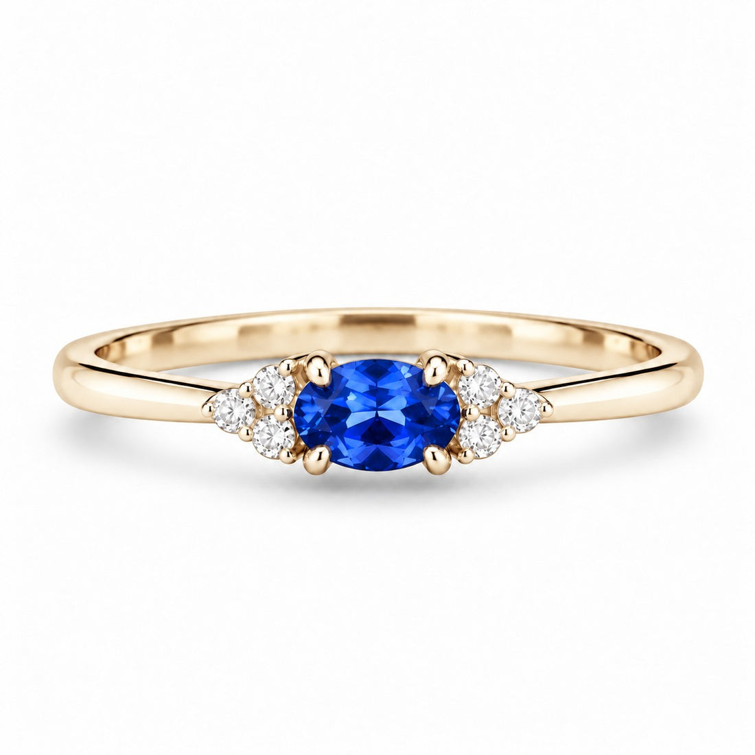 The Wren — Blue Oval Sapphire with Diamond Accents Ring in 14K yellow gold, front view