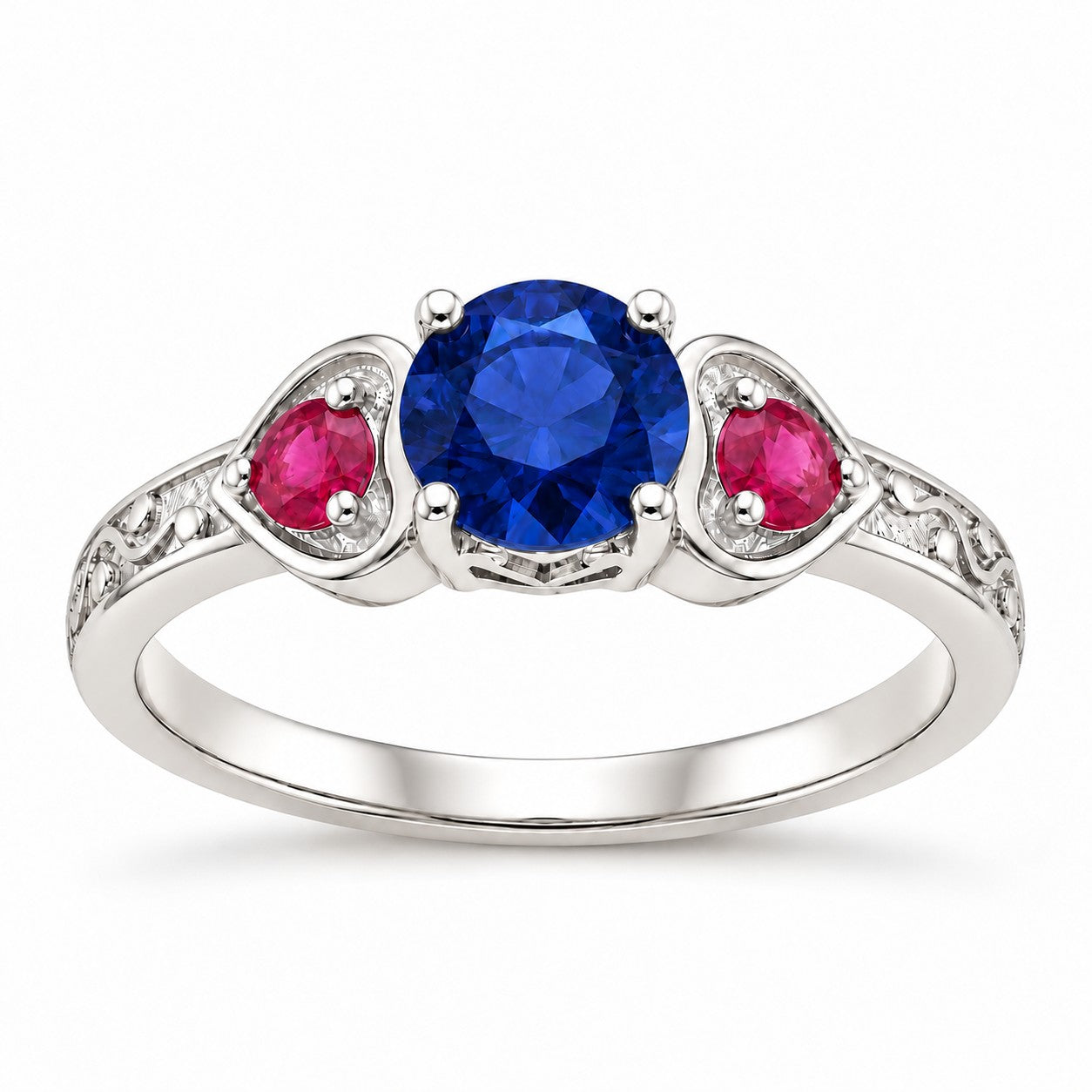 "Sapphire & Ruby" Three-Stone Ring: the heart frames and engraved vine