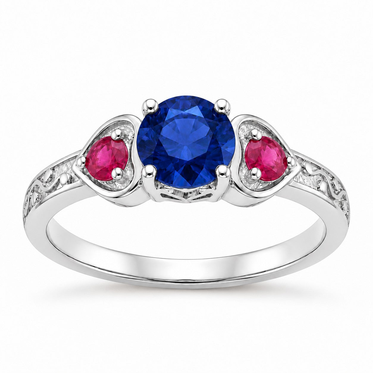 "Sapphire & Ruby" Three-Stone Ring: the heart frames and engraved vine