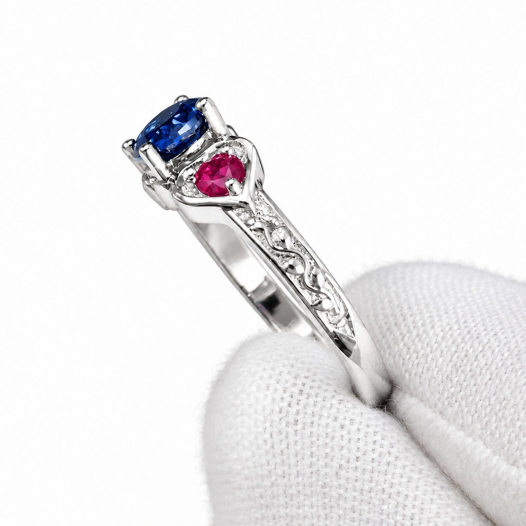 Sapphire and ruby three-stone ring with leaf band in sterling silver, detail view