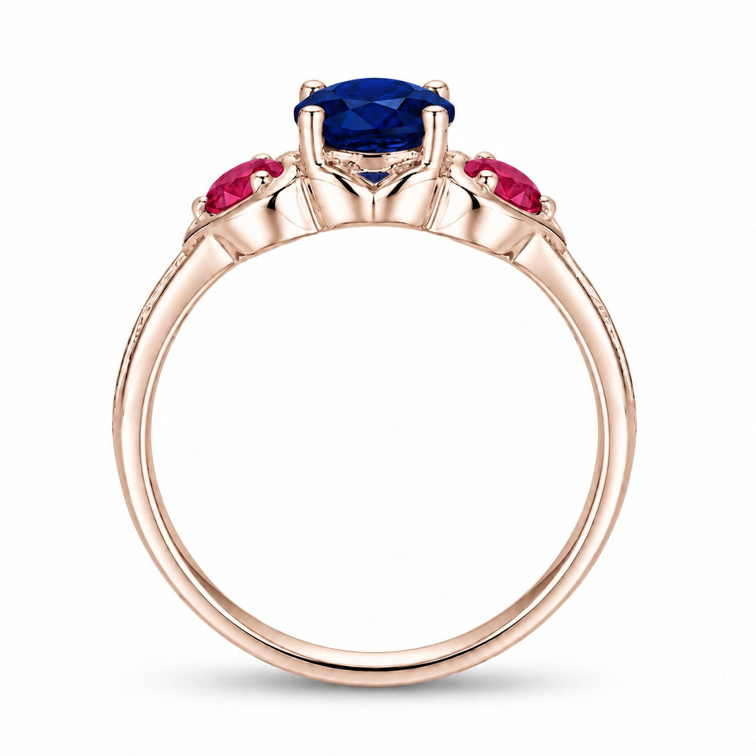 Sapphire and ruby three-stone ring with leaf band in 14K rose gold, profile view