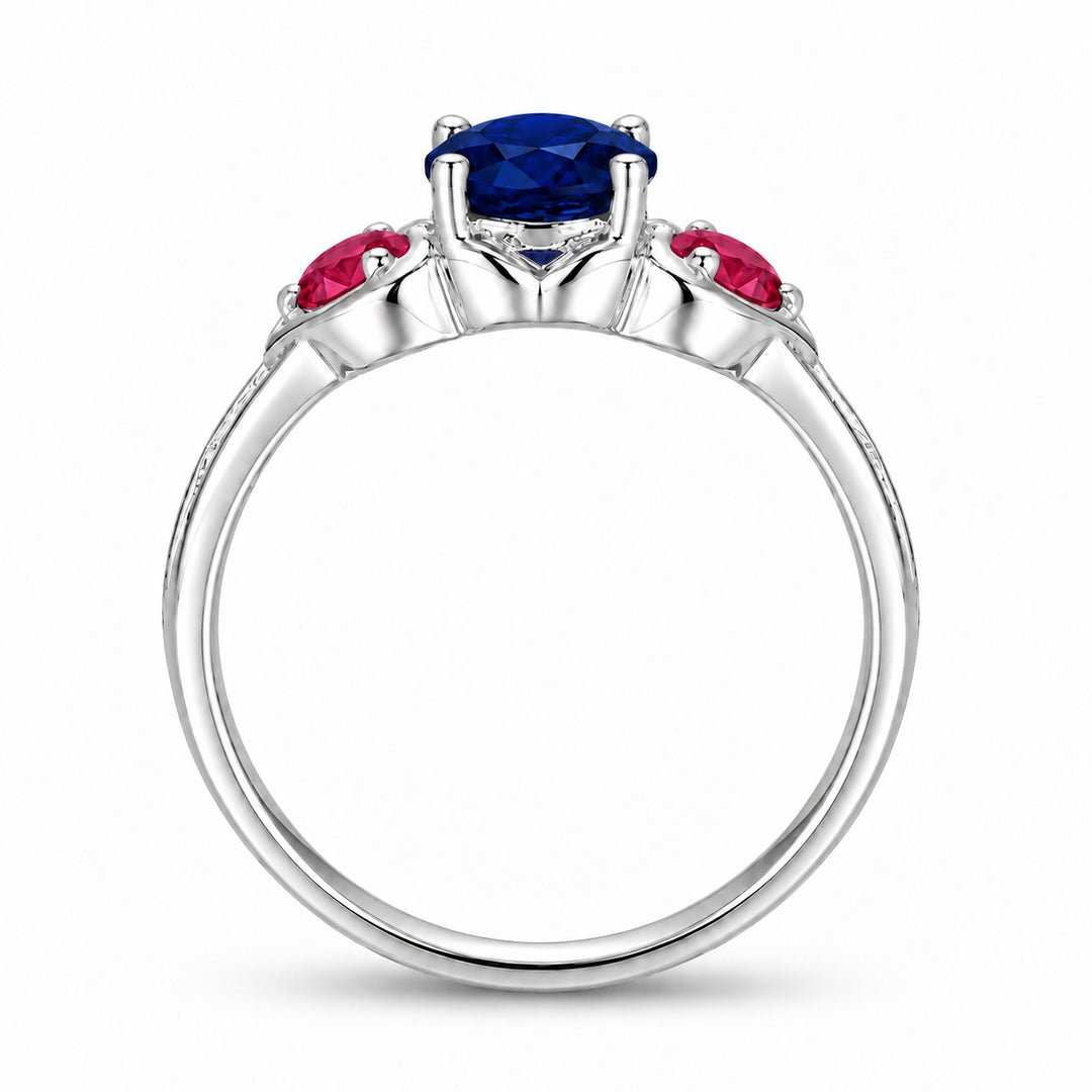 Sapphire and ruby three-stone ring with leaf band in sterling silver, profile view