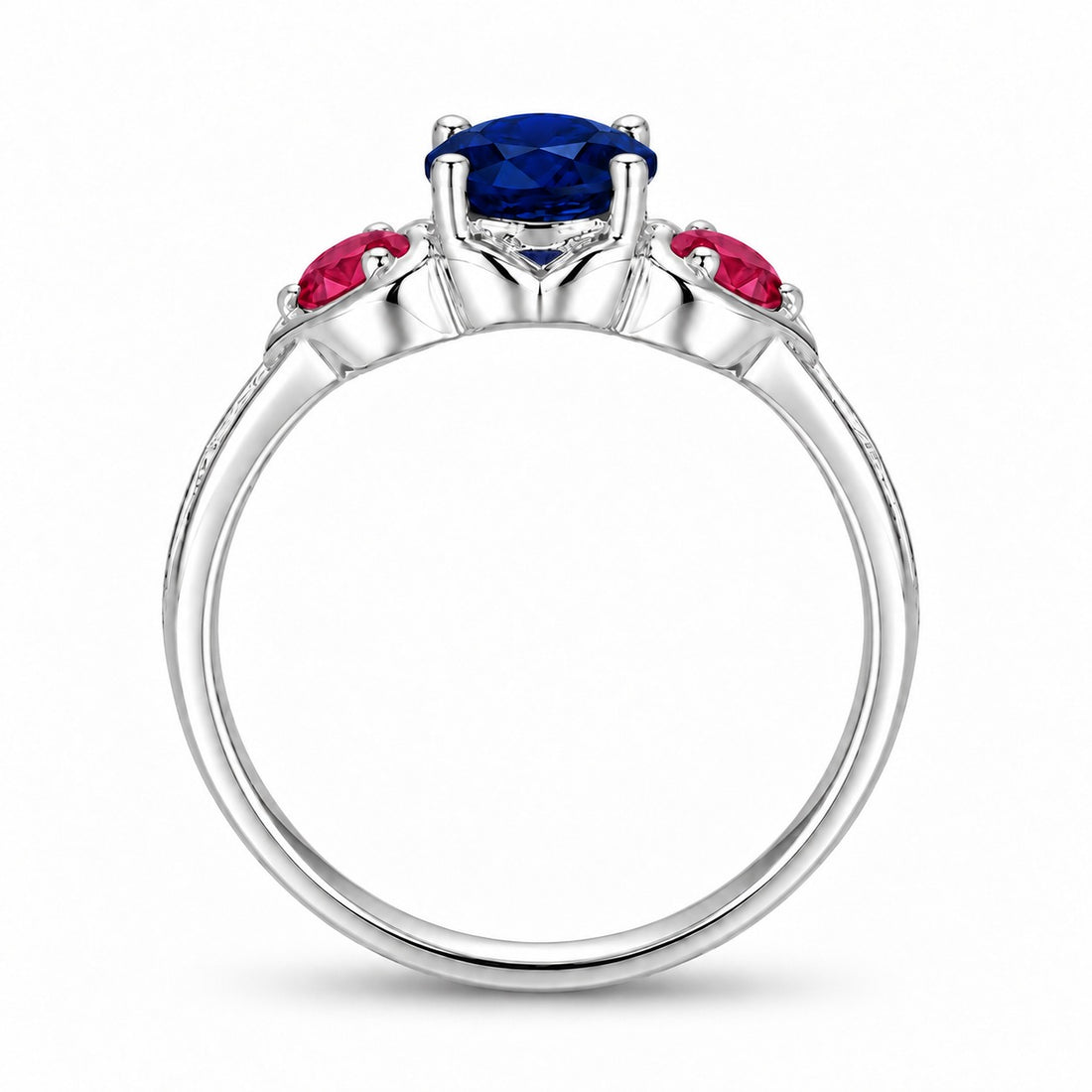 Sapphire and ruby three-stone ring with leaf band in sterling silver, profile view