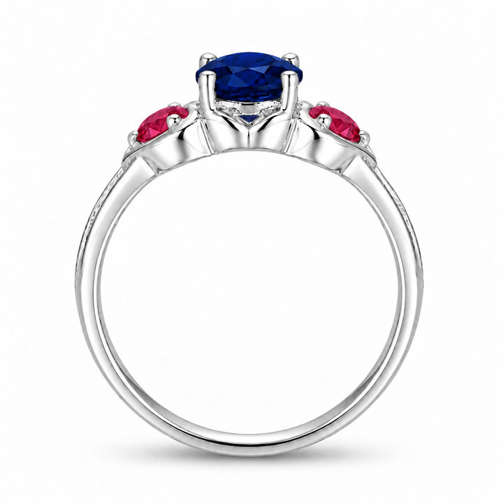 Sapphire and ruby three-stone ring with leaf band in sterling silver, profile view
