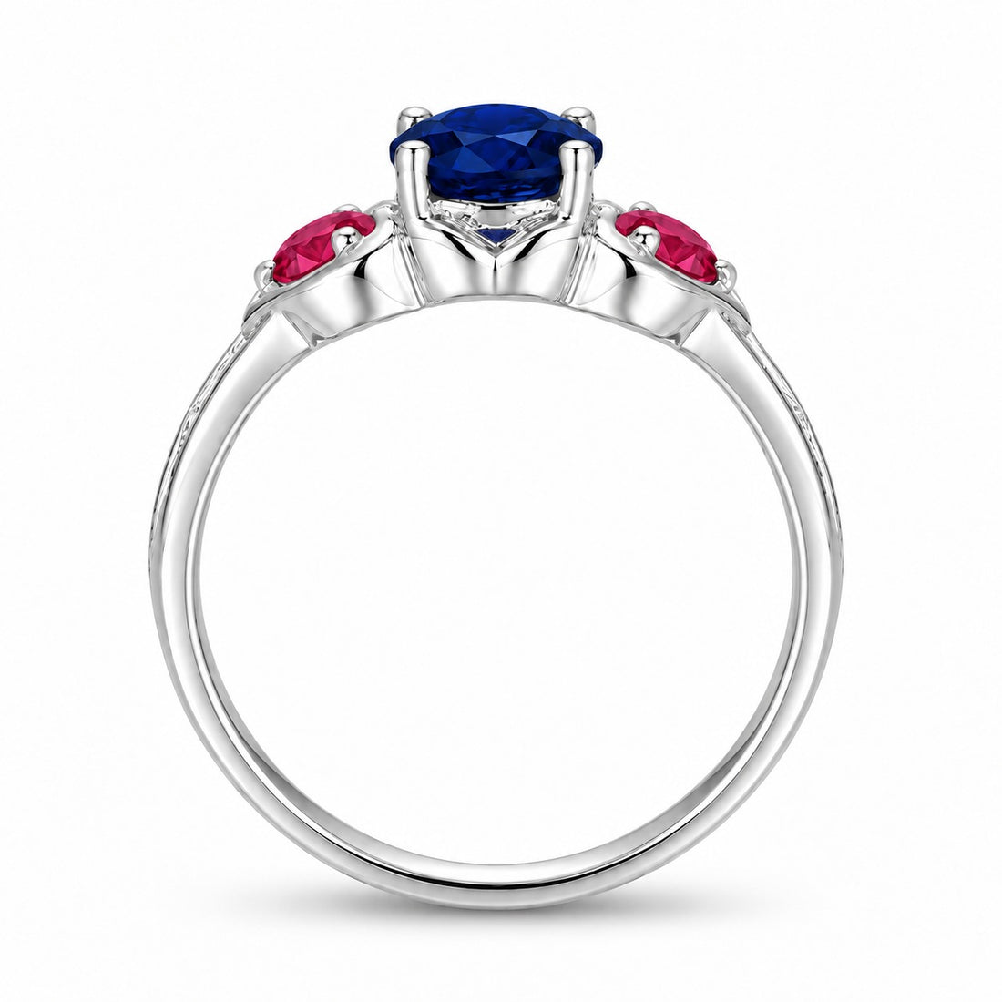 Sapphire and ruby three-stone ring with leaf band in 14K white gold, profile view
