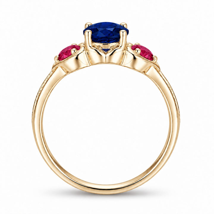 Sapphire and ruby three-stone ring with leaf band in 14K yellow gold, profile view