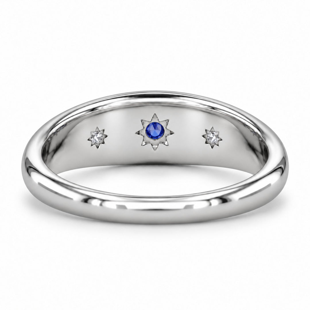The Stella blue sapphire star-set dome band in platinum, back view