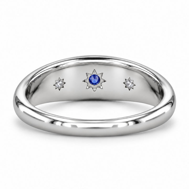 The Stella blue sapphire star-set dome band in platinum, back view