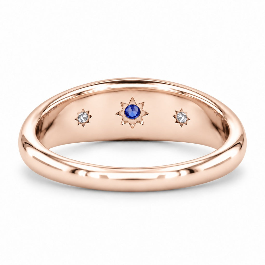 The Stella blue sapphire star-set dome band in 14K rose gold, back view