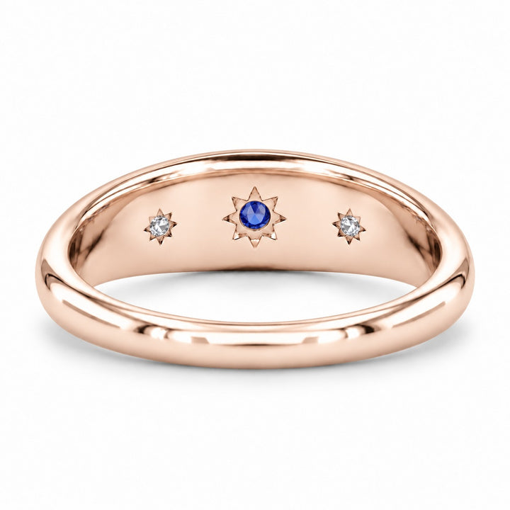 The Stella blue sapphire star-set dome band in 14K rose gold, back view