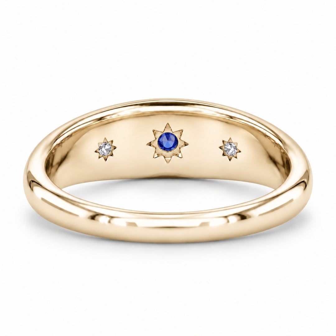 The Stella blue sapphire star-set dome band in 14K yellow gold, back view