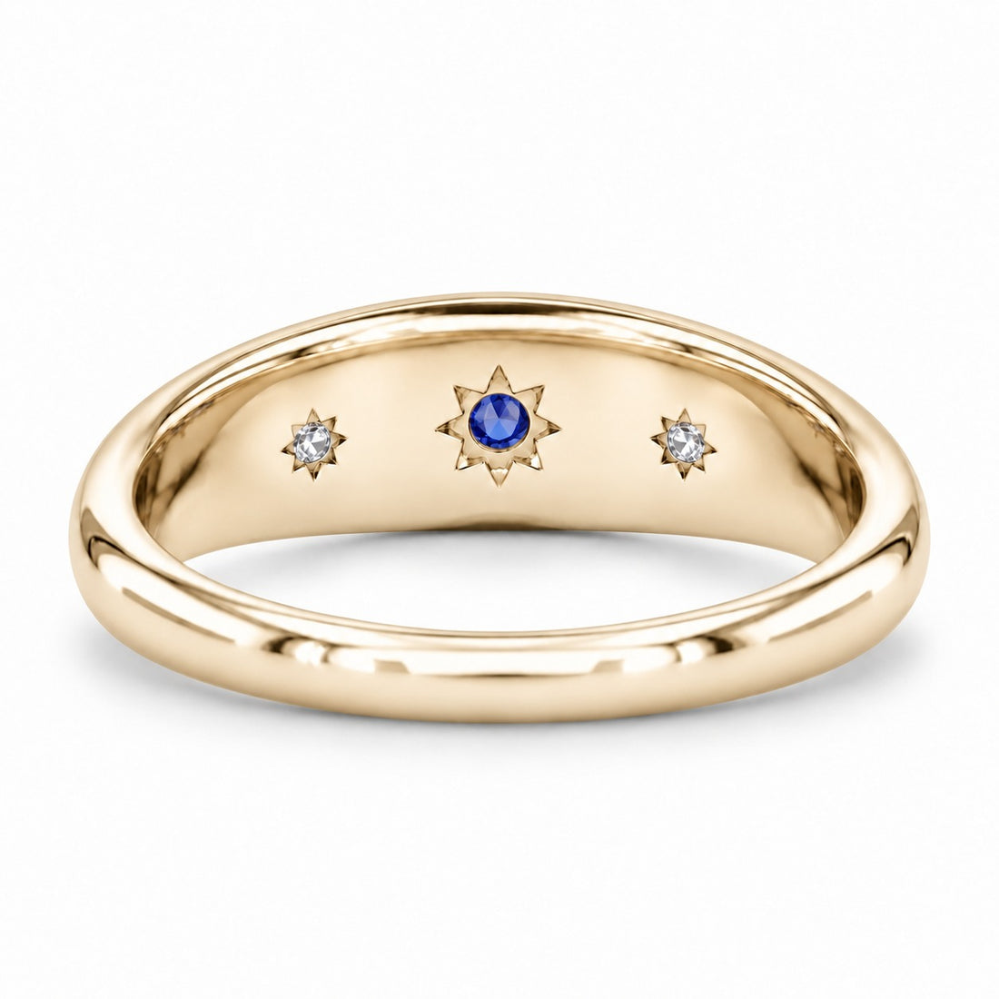 The Stella blue sapphire star-set dome band in 14K yellow gold, back view
