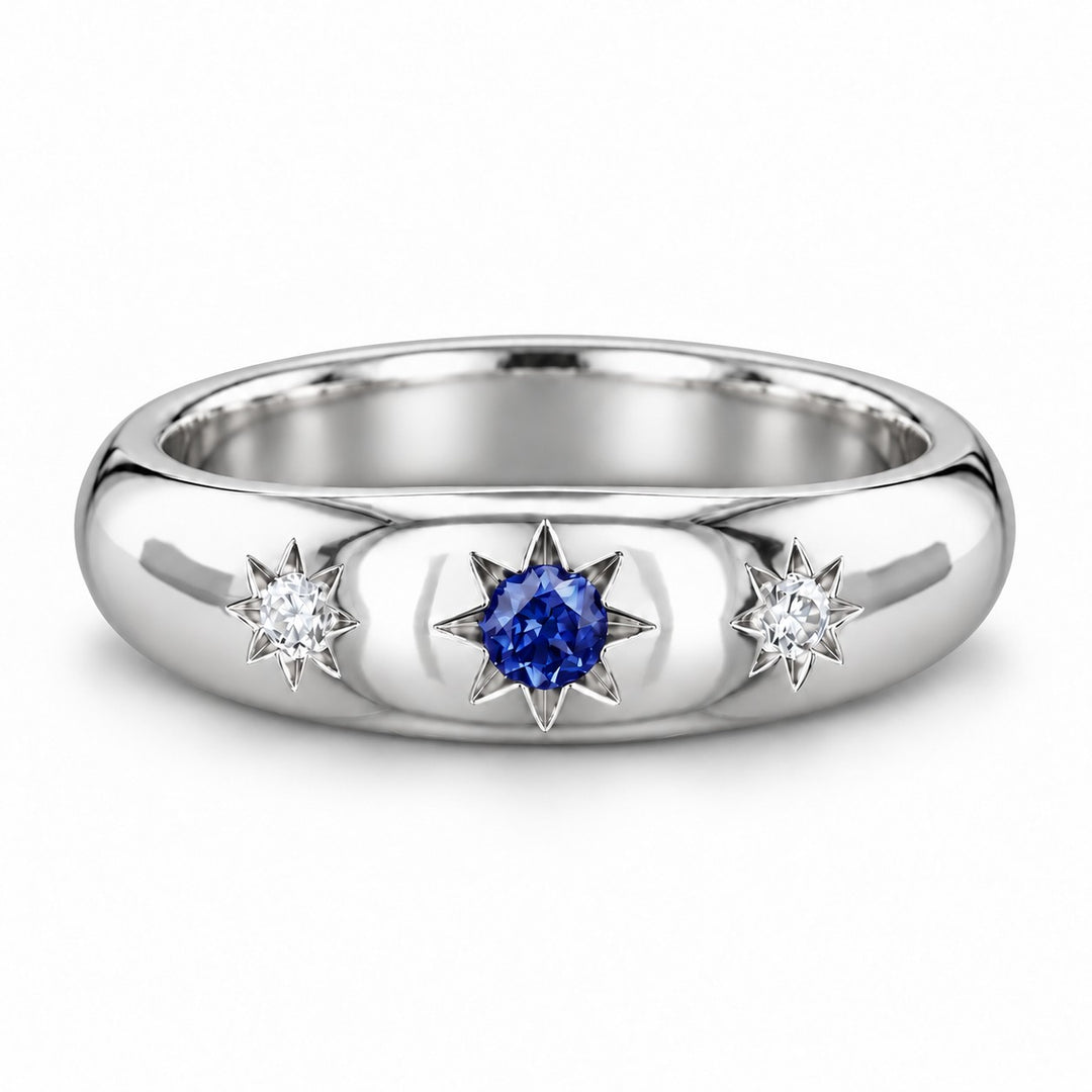 The Stella — Blue Round Sapphire Star-Set Dome Band Ring in platinum, front view