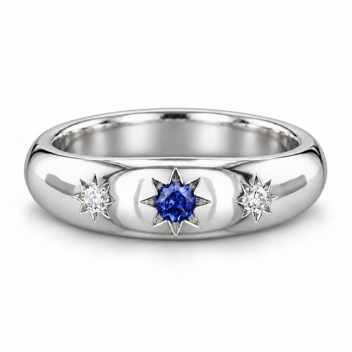 The Stella — Blue Round Sapphire Star-Set Dome Band Ring in platinum, front view
