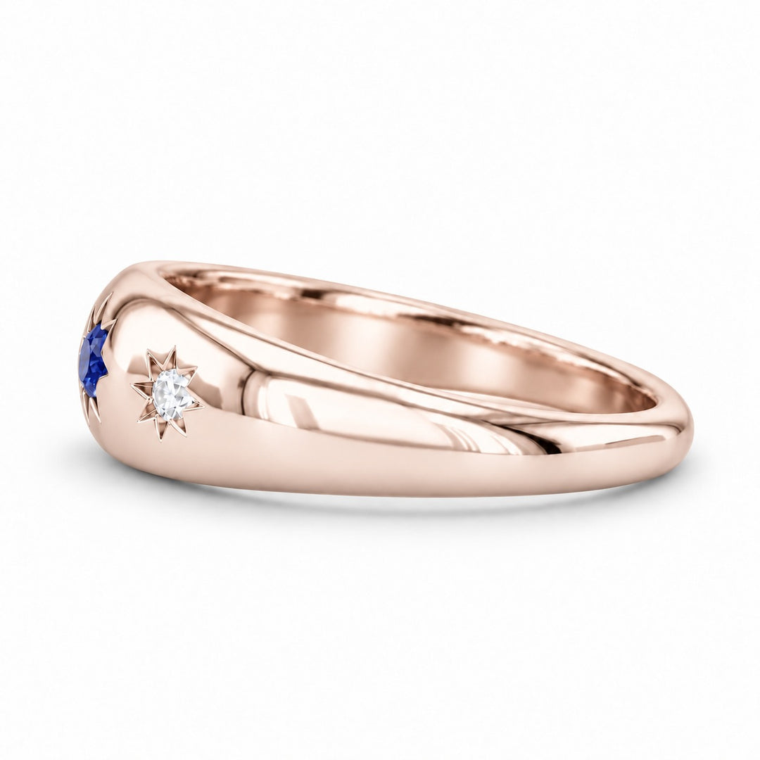 The Stella blue sapphire star-set dome band in 14K rose gold, side view