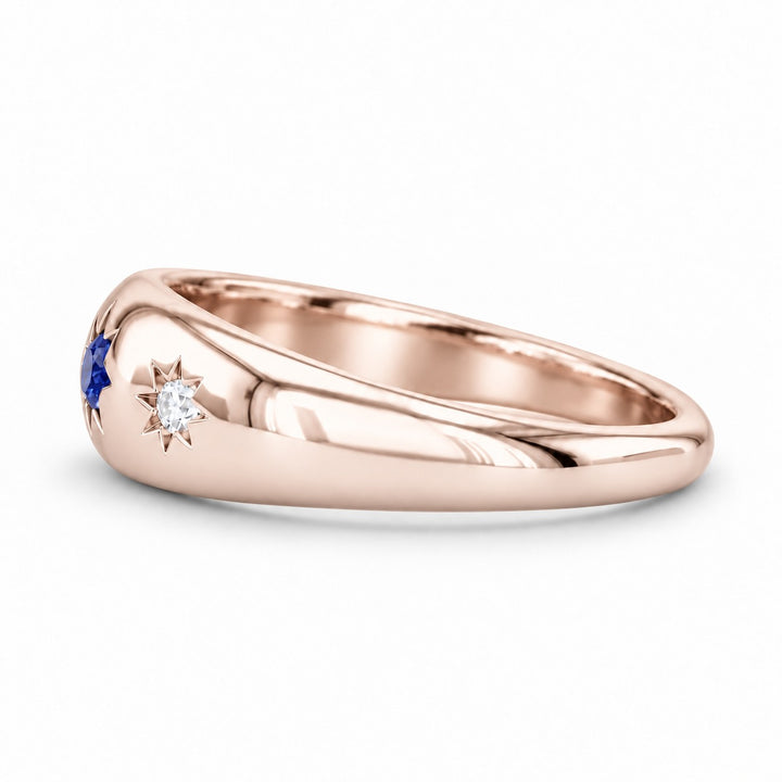 The Stella blue sapphire star-set dome band in 14K rose gold, side view