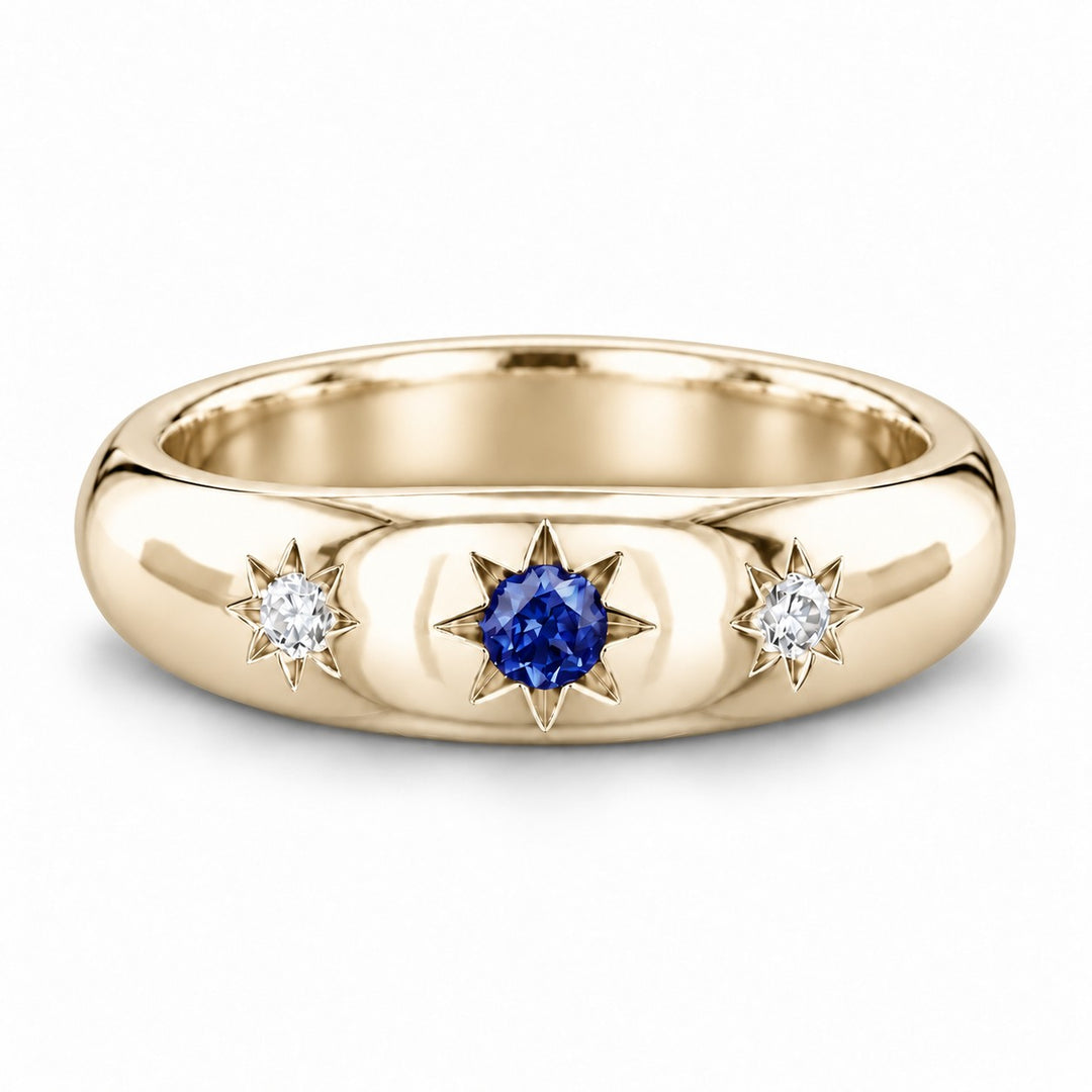 The Stella — Blue Round Sapphire Star-Set Dome Band Ring in 14K yellow gold, front view