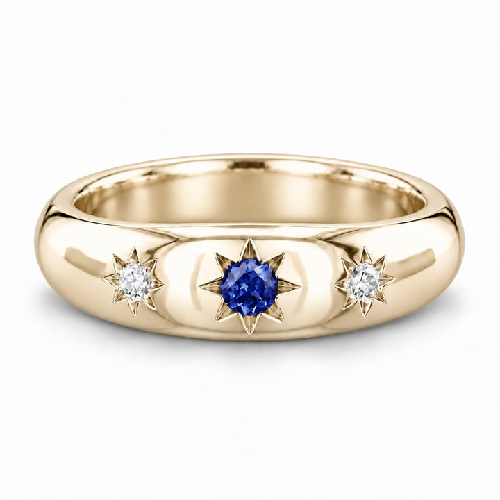 The Stella — Blue Round Sapphire Star-Set Dome Band Ring in 14K yellow gold, front view