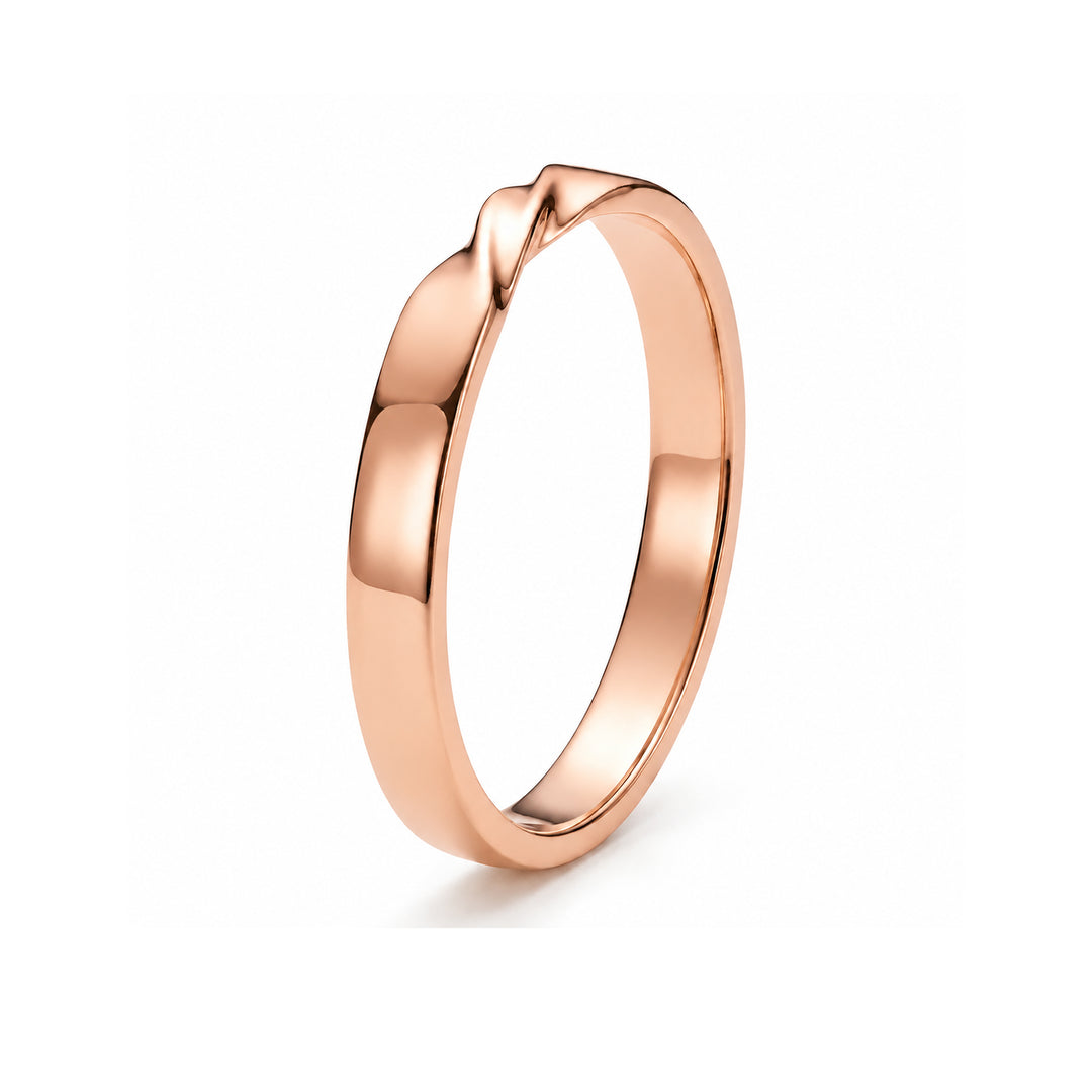 The Chevron Twist — 3mm Solid Gold Wedding Band in rose gold, standing view