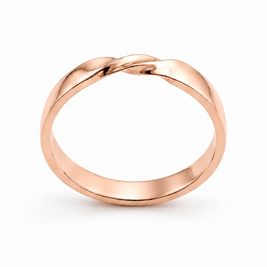 The Chevron Twist — 3mm Solid Gold Wedding Band in rose gold, profile view