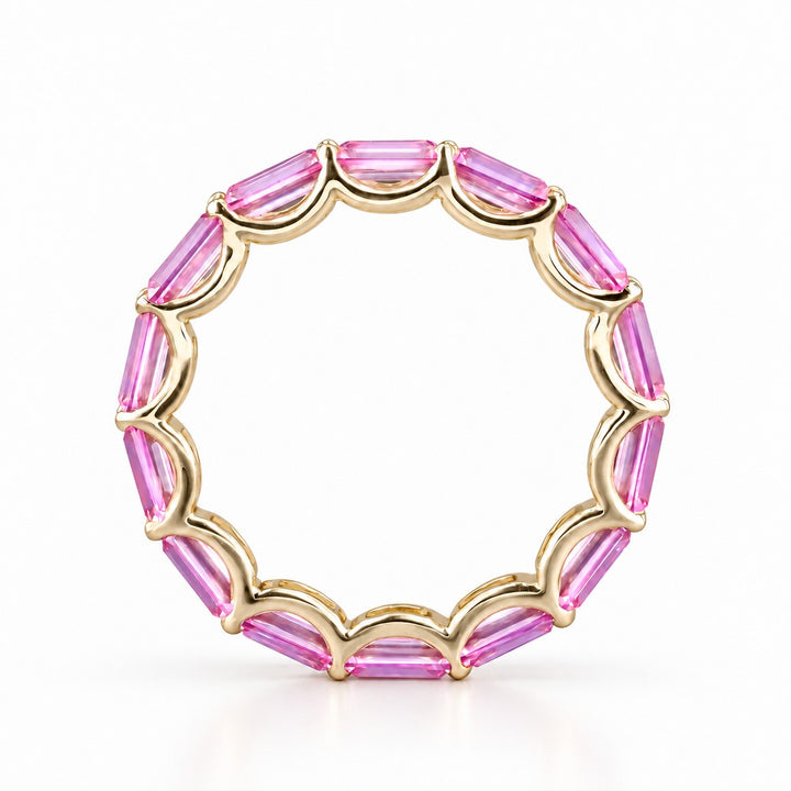 East-West Emerald-Cut Pink Sapphire Eternity Band (2.5x5mm, 3.50ctw) in yellow gold, profile view