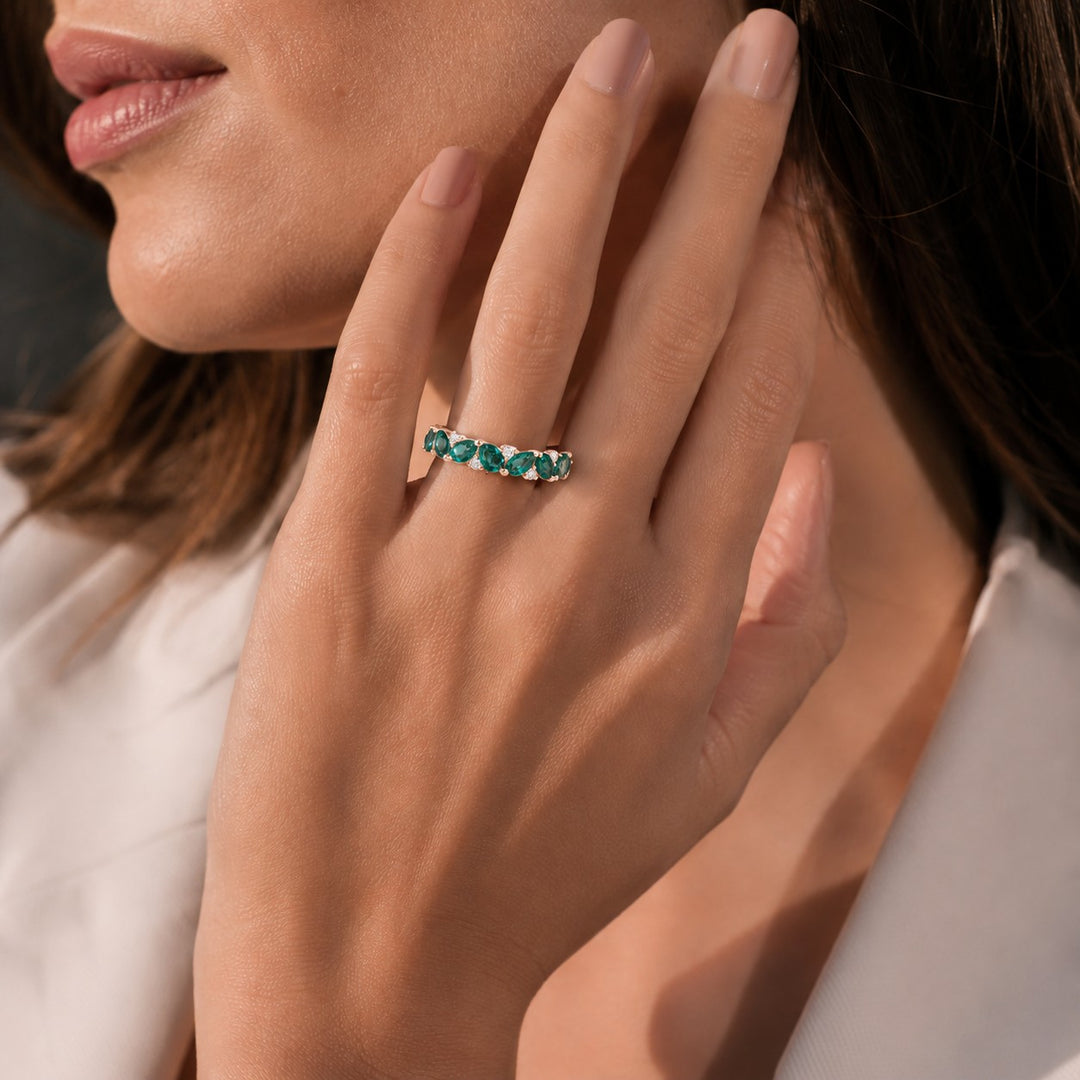 Pear Colombian Emerald & Round Diamond Eternity Band (3.5mm, 1.78ctw) worn on the hand in 14K Rose Gold