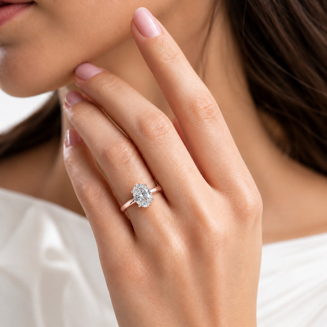 The Whisper Four in 14K rose gold, on the hand