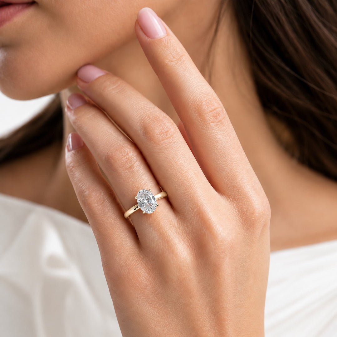 The Whisper Four in 14K yellow gold, on the hand